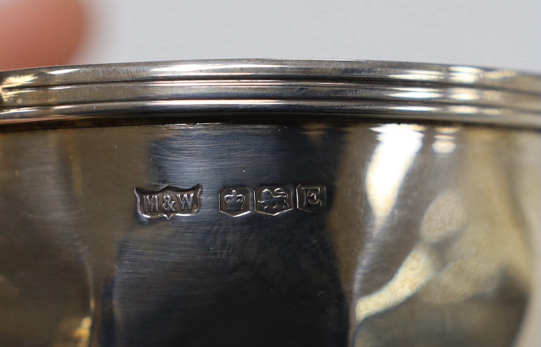 A George VI panelled silver coffee pot, hot water pot and sugar bowl by Mappin & Webb, Sheffield, 1947, gross weight 30.9oz.